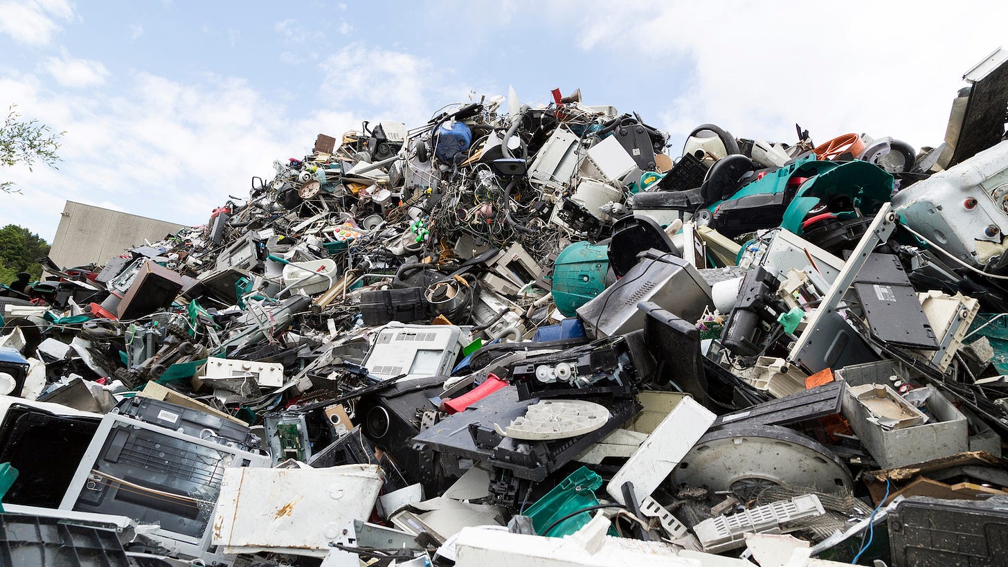 Image of electronic waste in a landfill