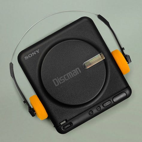 Photos of the Ryuichi Sakamoto "Smochy" compact disc, a Sony Discman D-2, and Sony CPA-7.