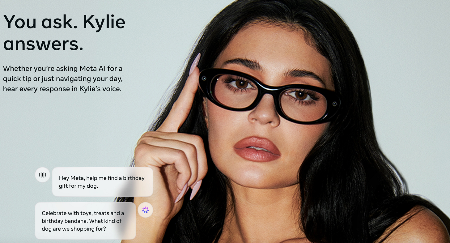 Screenshot of Meta's marketing page for its Kylie Jenner smart glasses. Kylie Jenner wears black oval AI glasses beside the headline "You ask. Kylie answers." Text explains that Meta AI responses can be heard in Kylie's voice. A sample exchange shows a user saying "Hey Meta, help me find a birthday gift for my dog," and the AI answering, "Celebrate with toys, treats and a birthday bandana. What kind of dog are we shopping for?" Screenshot of Meta's marketing page for its Kylie Jenner smart glasses. Kylie Jenner wears black oval AI glasses beside the headline "You ask. Kylie answers." Text explains that Meta AI responses can be heard in Kylie's voice. A sample exchange shows a user saying "Hey Meta, help me find a birthday gift for my dog," and the AI answering, "Celebrate with toys, treats and a birthday bandana. What kind of dog are we shopping for?"