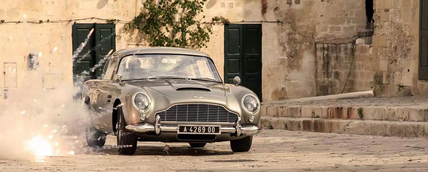 James Bond Stunt Double Puts Aston Martin Through Hell In Chase Scene | James  Bond In Car | sincovaga.com.br