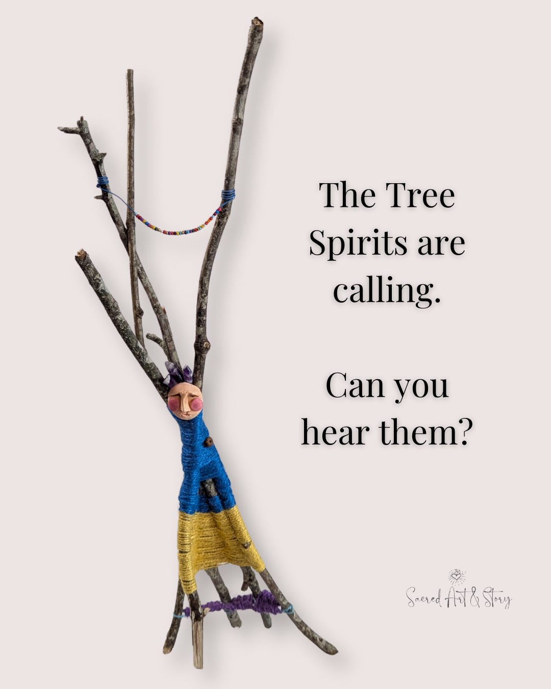 a stick doll made from tree branches with blue and yellow twine wrapped around as the body and a clay face. the words on the image say the tree spirits are calling. can you hear them?