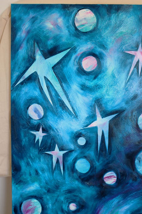 Series of oil paintings by Julia Bethan, blues, pinks and whites. Paintings are abstract oils of landscapes and stars.