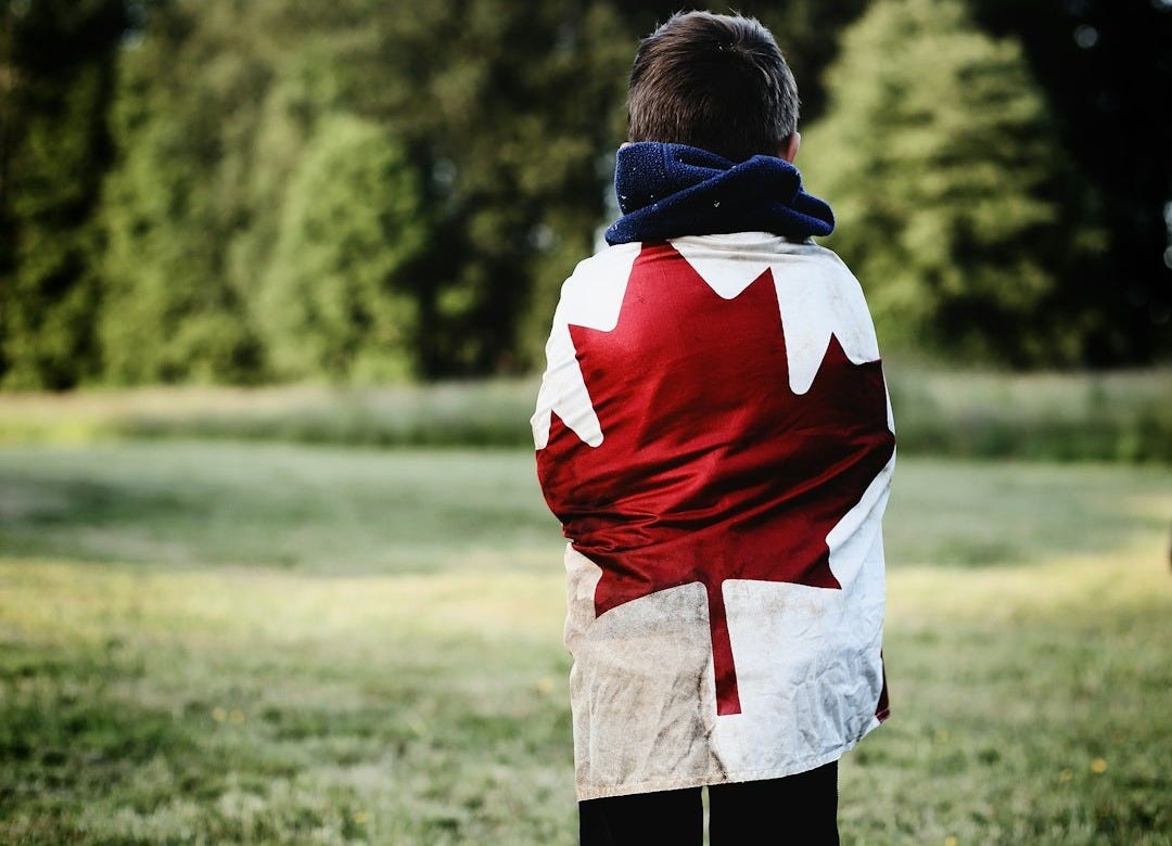 child wearing Canada flag child wearing Canada flag