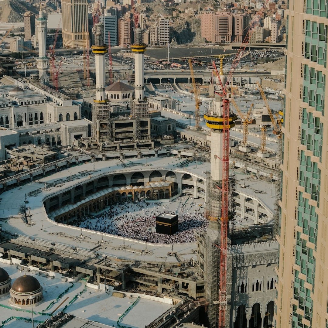 Aerial view of the Kaaba and Masjid al-Haram in Mecca with construction cranes Aerial view of the Kaaba and Masjid al-Haram in Mecca with construction cranes