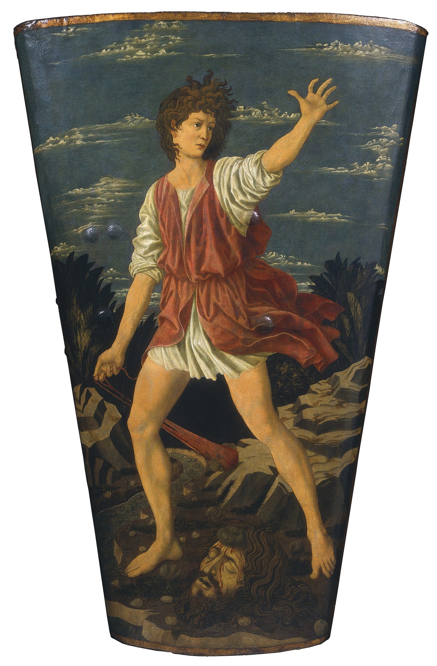 On a tall curved shield, a young David in a red tunic swings his sling, while Goliath's severed head lies between his feet. On a tall curved shield, a young David in a red tunic swings his sling, while Goliath's severed head lies between his feet.