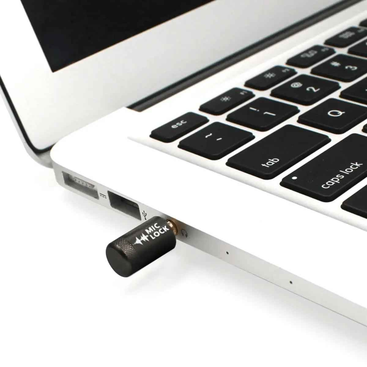A microphone blocker inserted into a laptop
