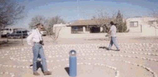 man and woman walking a labyrinth