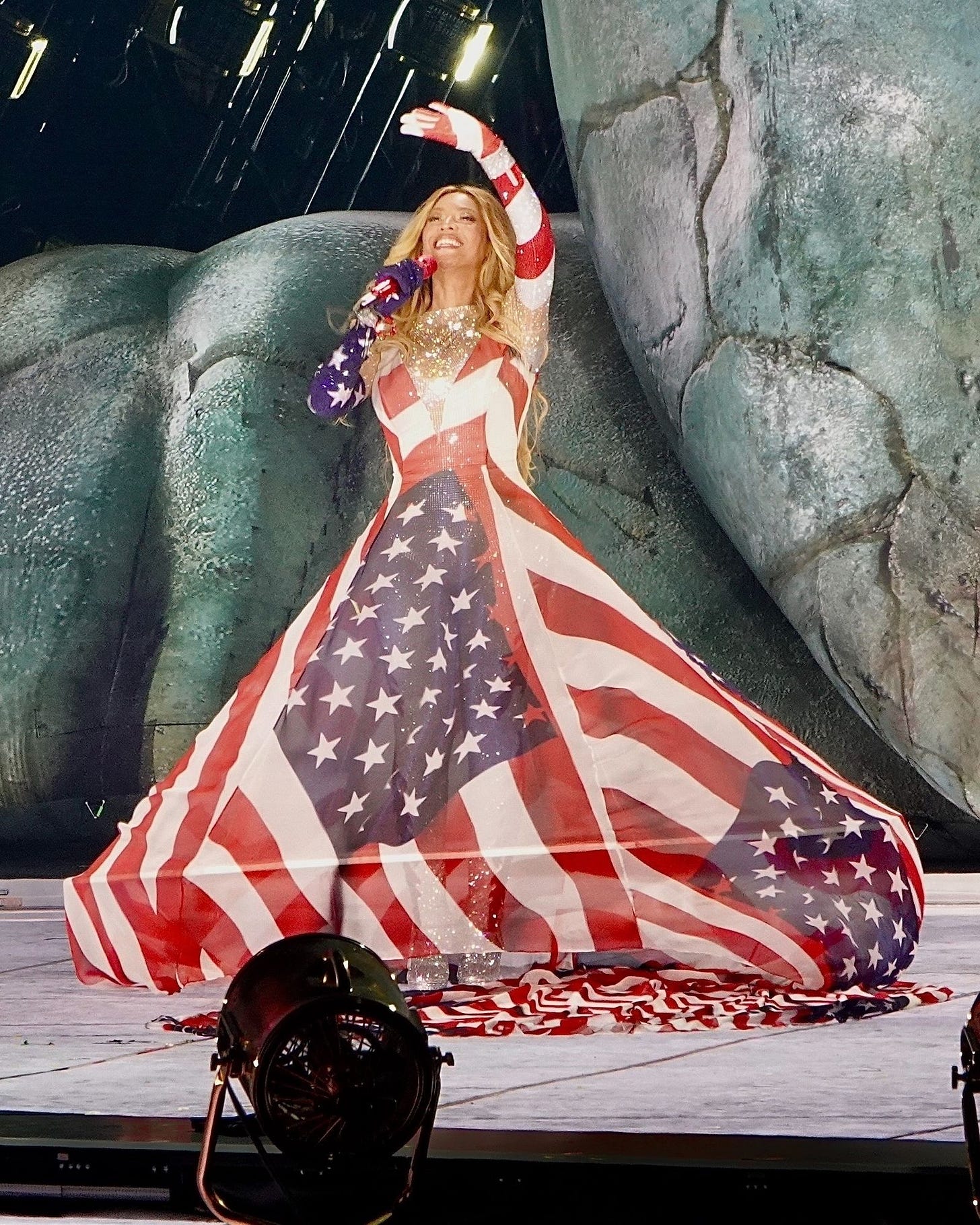 Image may contain Beyonc Performer Person Solo Performance Adult Wedding Clothing Dress and Formal Wear