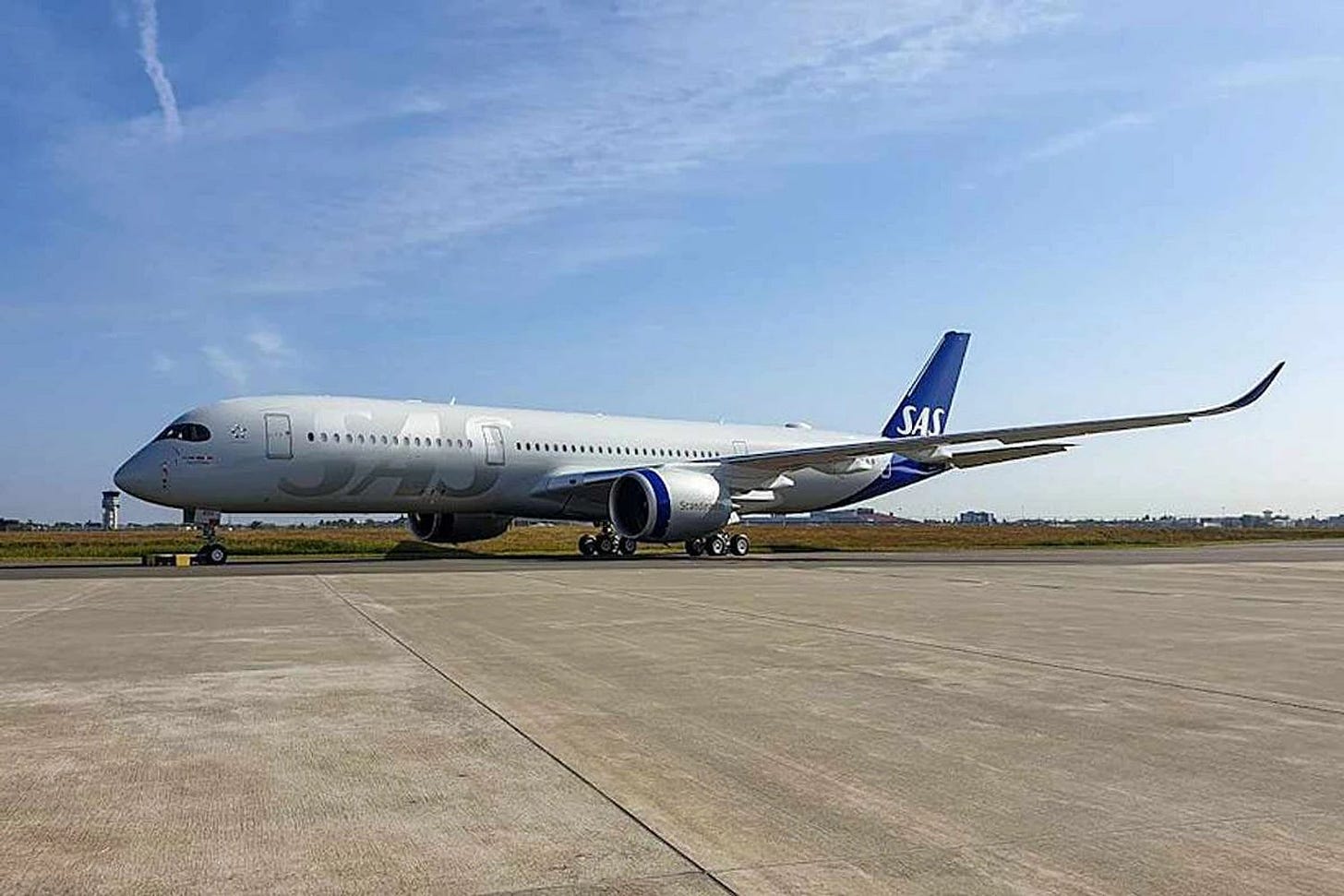 SAS A350 in new livery above the clouds