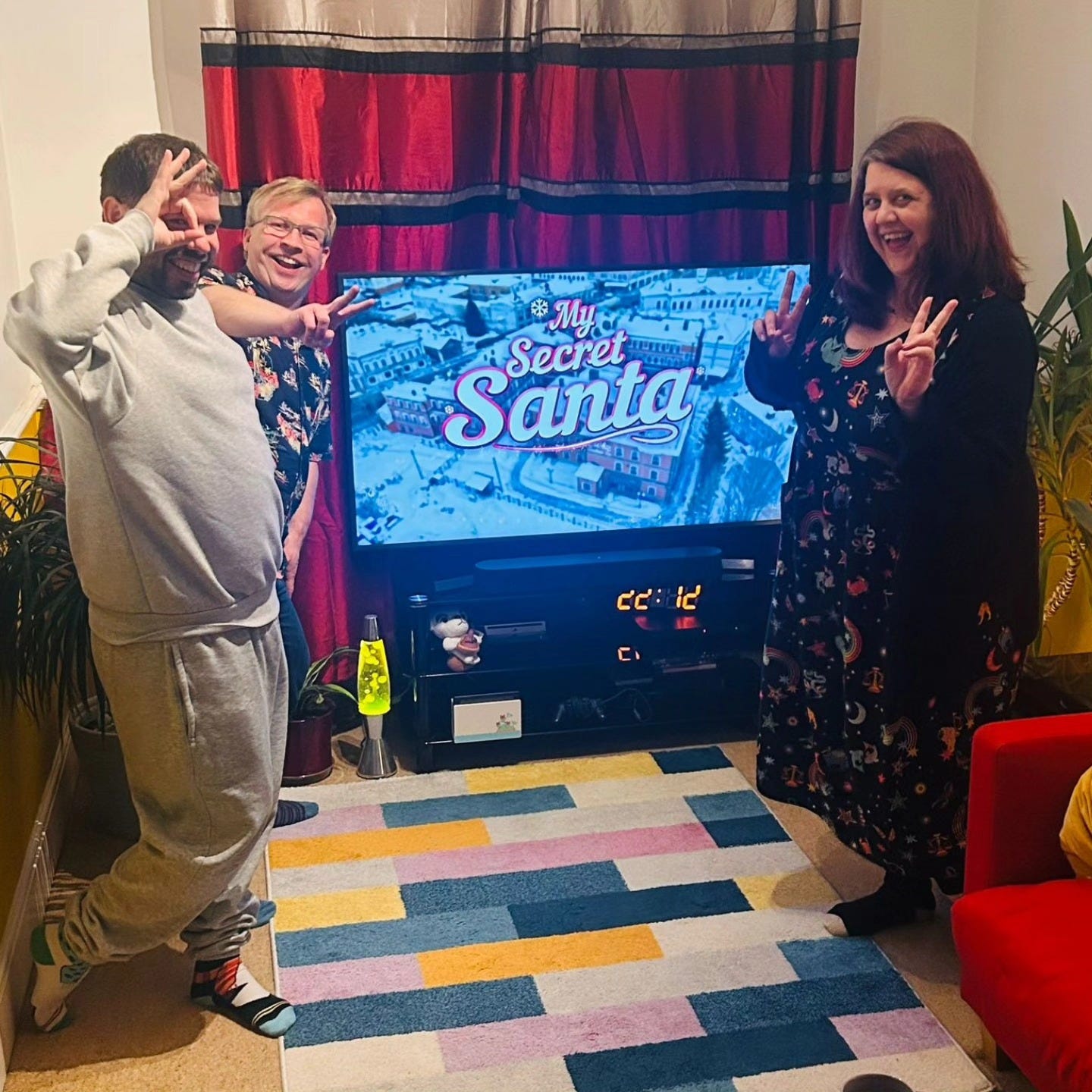 May be an image of television, christmas tree and text