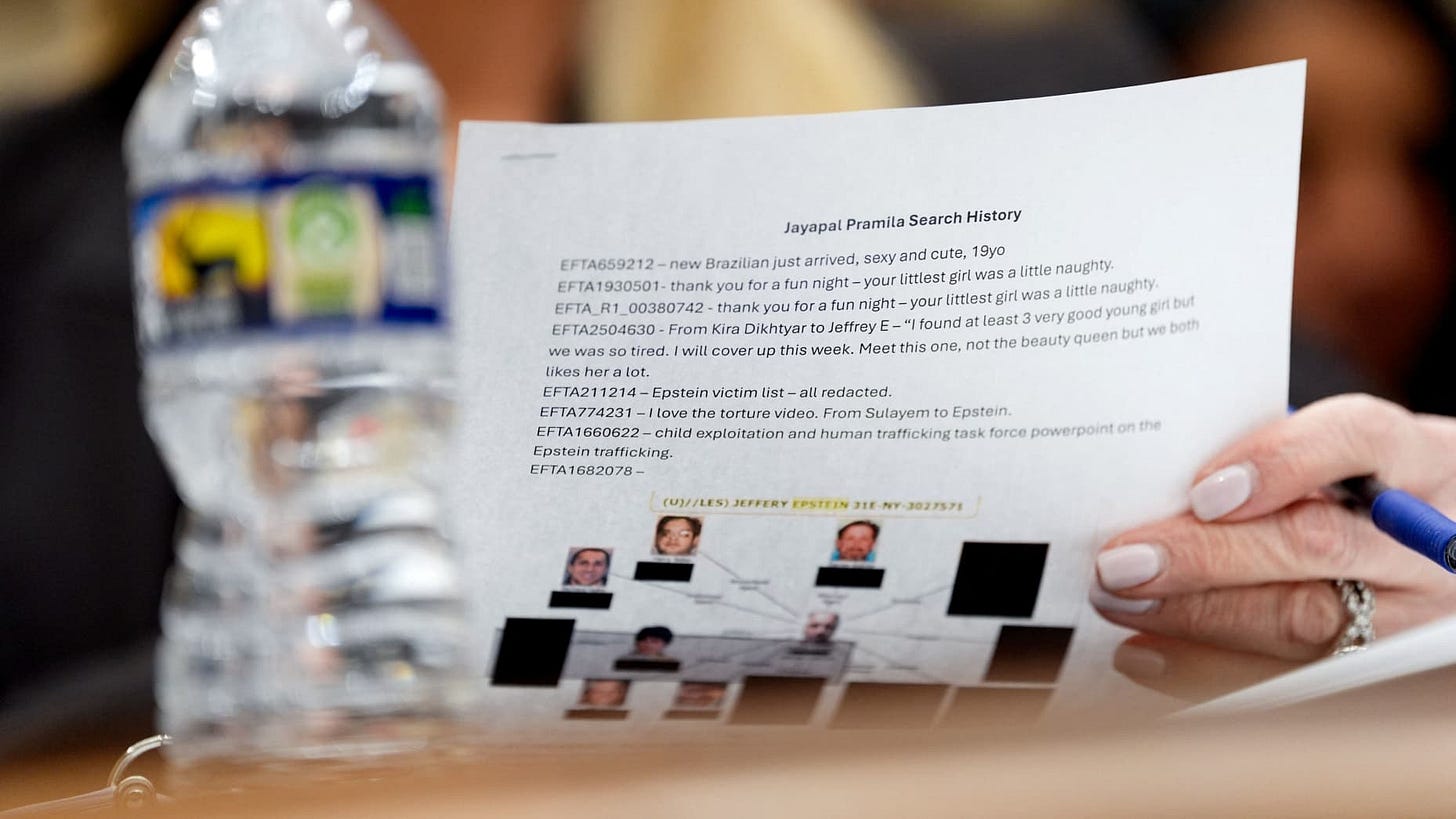U.S. Attorney General Pam Bondi holds a piece of paper labelled "Jayapal Pramila Search History", in reference to U.S. Representative Pramila Jayapal (D-WA), a member of the House Judiciary Committee, during the committee's hearing on oversight of the Justice Department, on Capitol Hill in Washington, D.C., U.S., February 11, 2026. REUTERS/Kent Nishimura