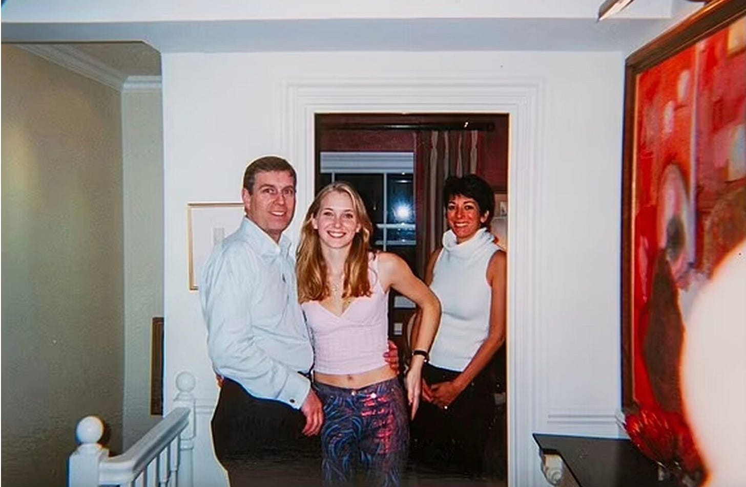 The famous photo of Prince Andrew with teenaged Virginia Giuffre and Ghislaine Maxwell