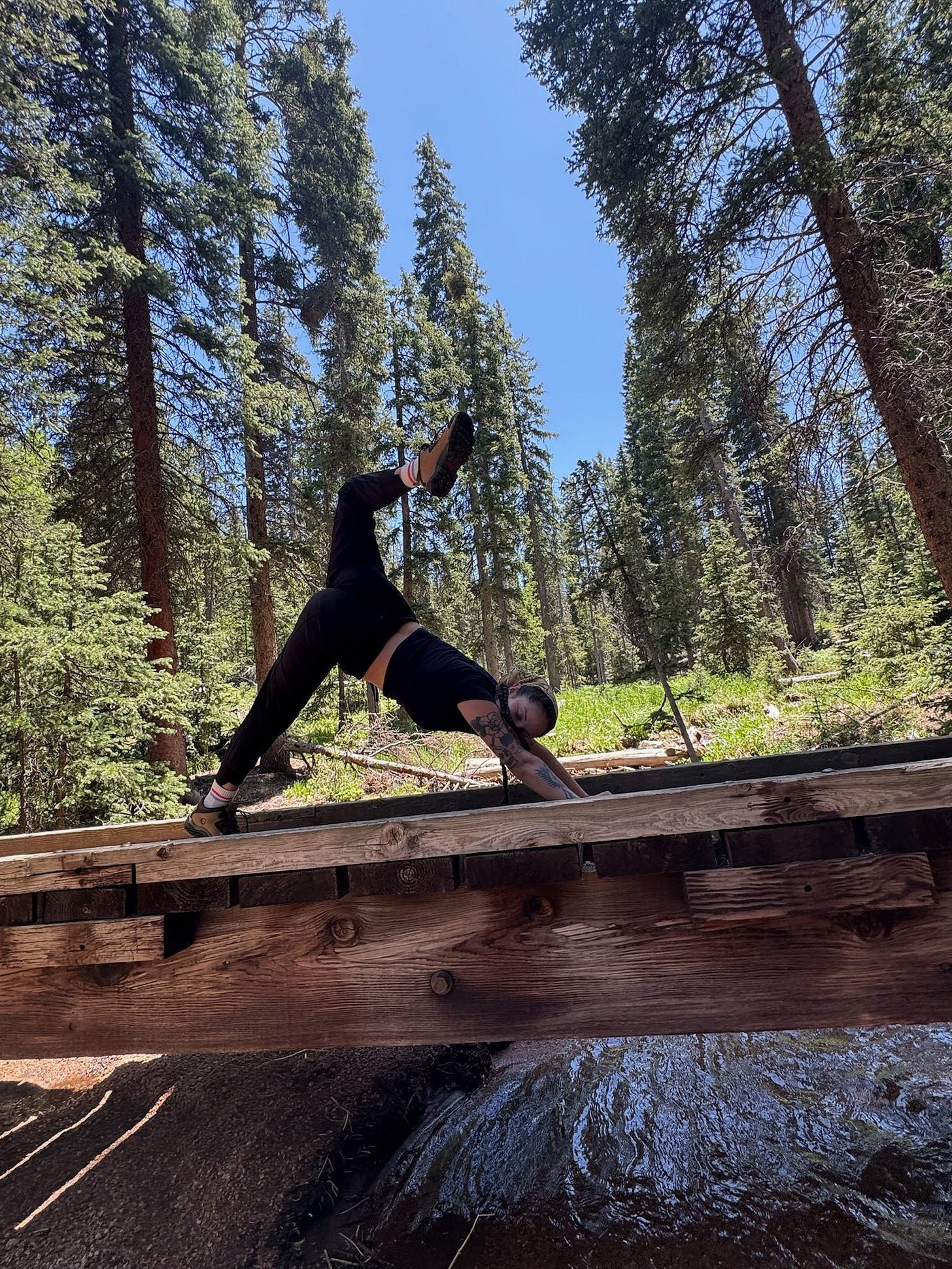 May be an image of 1 person and practicing yoga