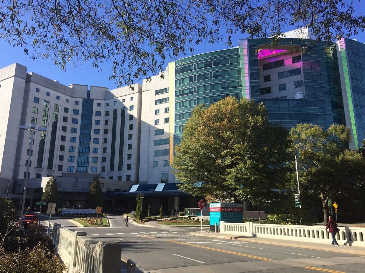 Shows the facade and approach of Atrium Health's Carolinas Medical Center in Charlotte Shows the facade and approach of Atrium Health's Carolinas Medical Center in Charlotte