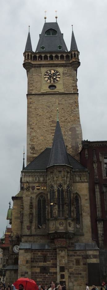 A tall building with a clock on it

AI-generated content may be incorrect.
