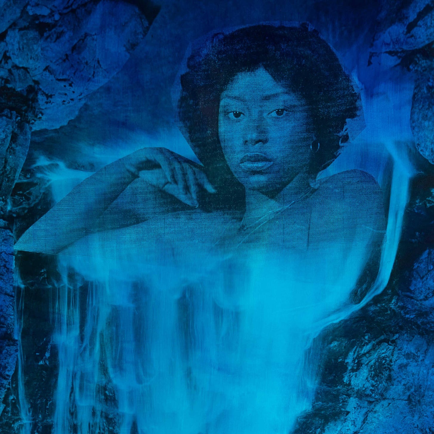 A blue glow surrounding woman of color.