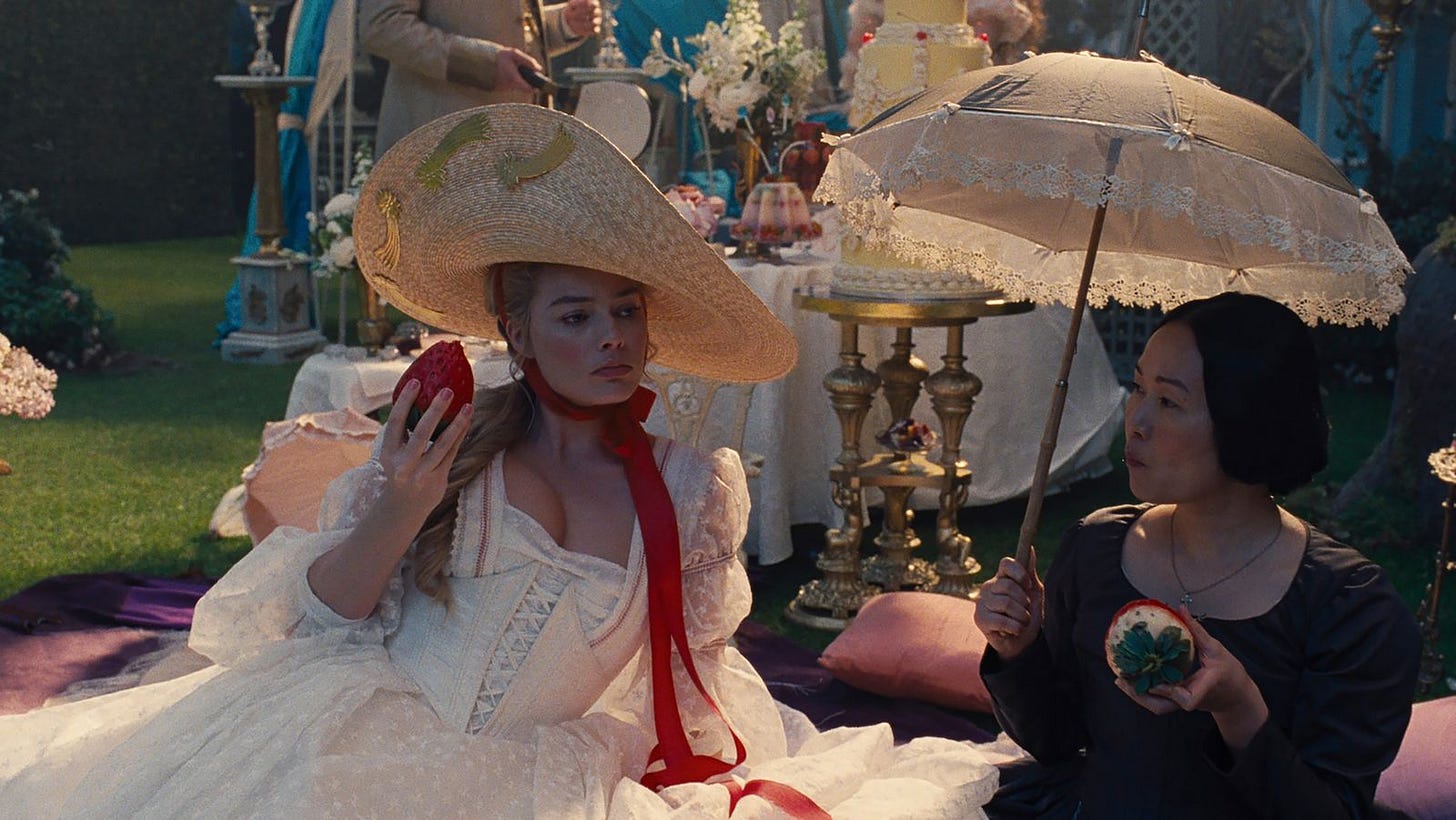 Image may contain Margot Robbie Clothing Hat Person Adult Face and Head