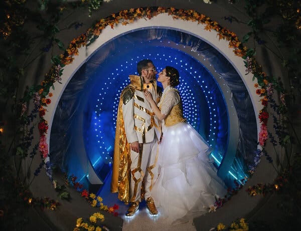Ms. Knox and Mr. Robinson at their wedding, on leap day in 2020. “In an alternate life, we’d be sci-fi event planners,” Mr. Robinson said.