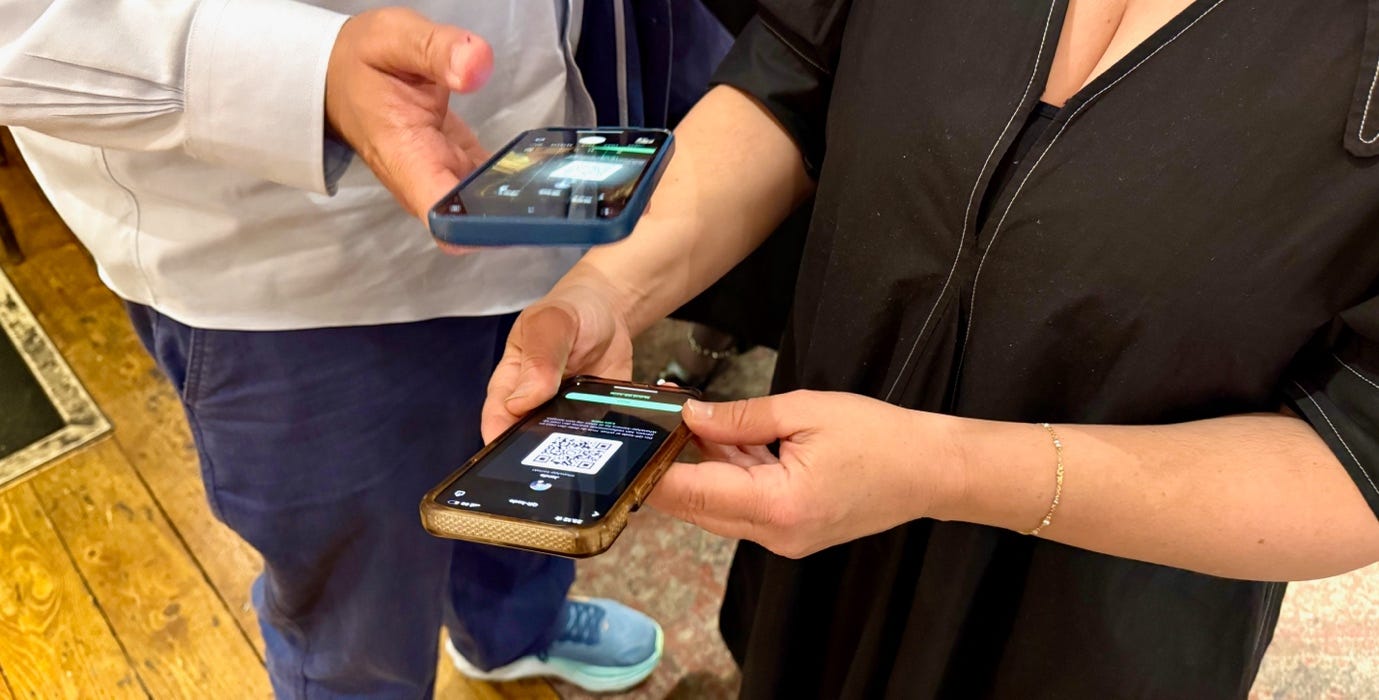 A person holding a cell phone

AI-generated content may be incorrect.