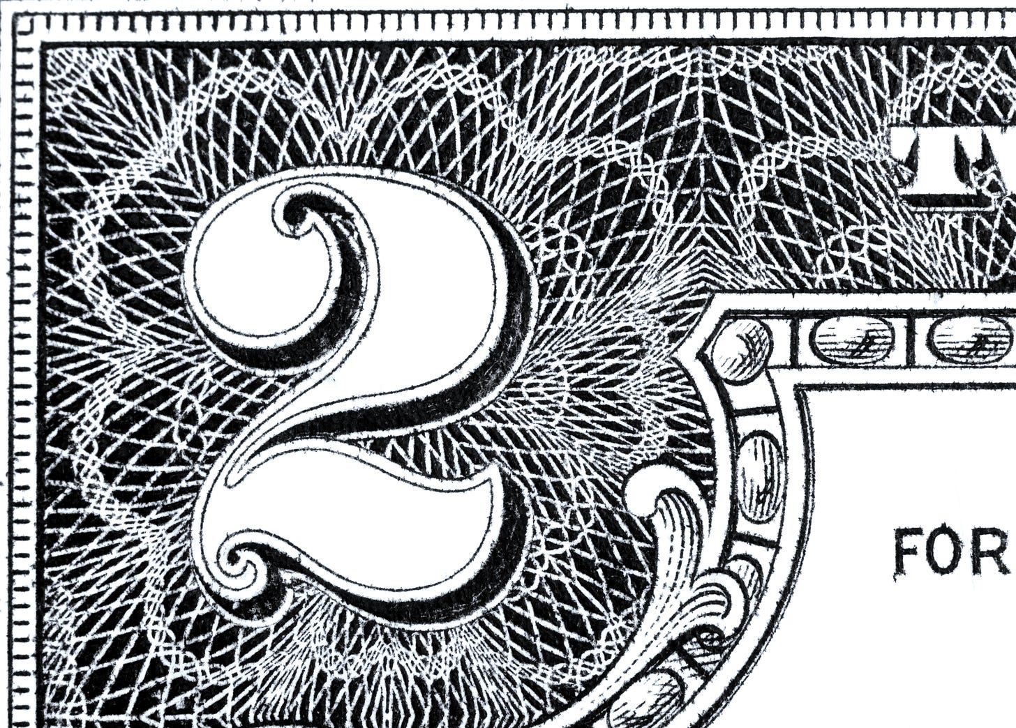 Close-up of the number two from a U.S. dollar bill, symbolizing doubling income and financial growth. Close-up of the number two from a U.S. dollar bill, symbolizing doubling income and financial growth.