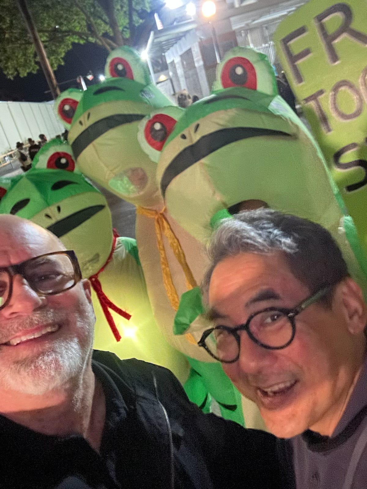People with Protesting Frogs in Portland
