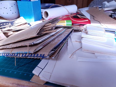 Books I made and workspace images from the tween time creativity.
