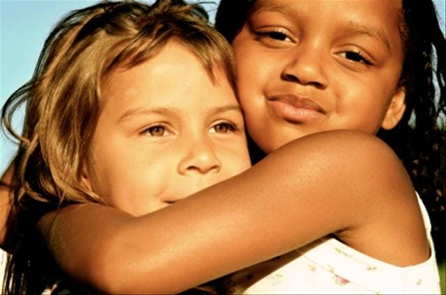 children hugging children hugging