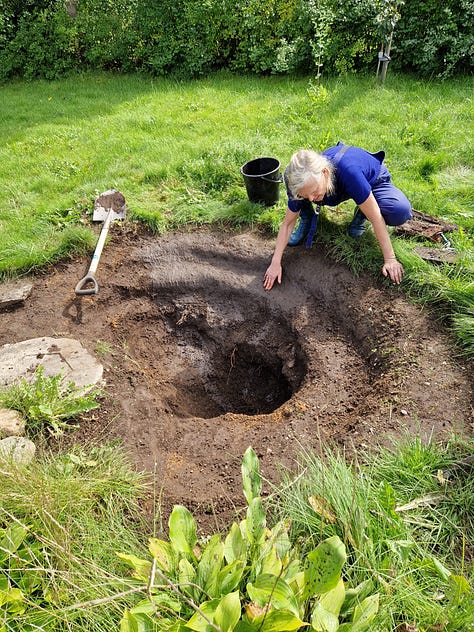 Stages of pond digging and filling with water