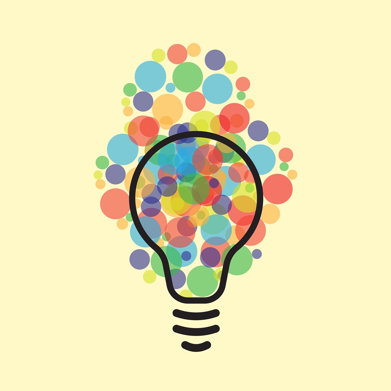 light bulb with colorful balls of different sizes floating around it.