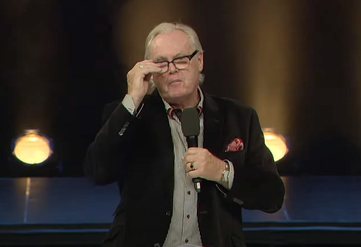 Mortlock on stage giving a sermon at City Impact Church