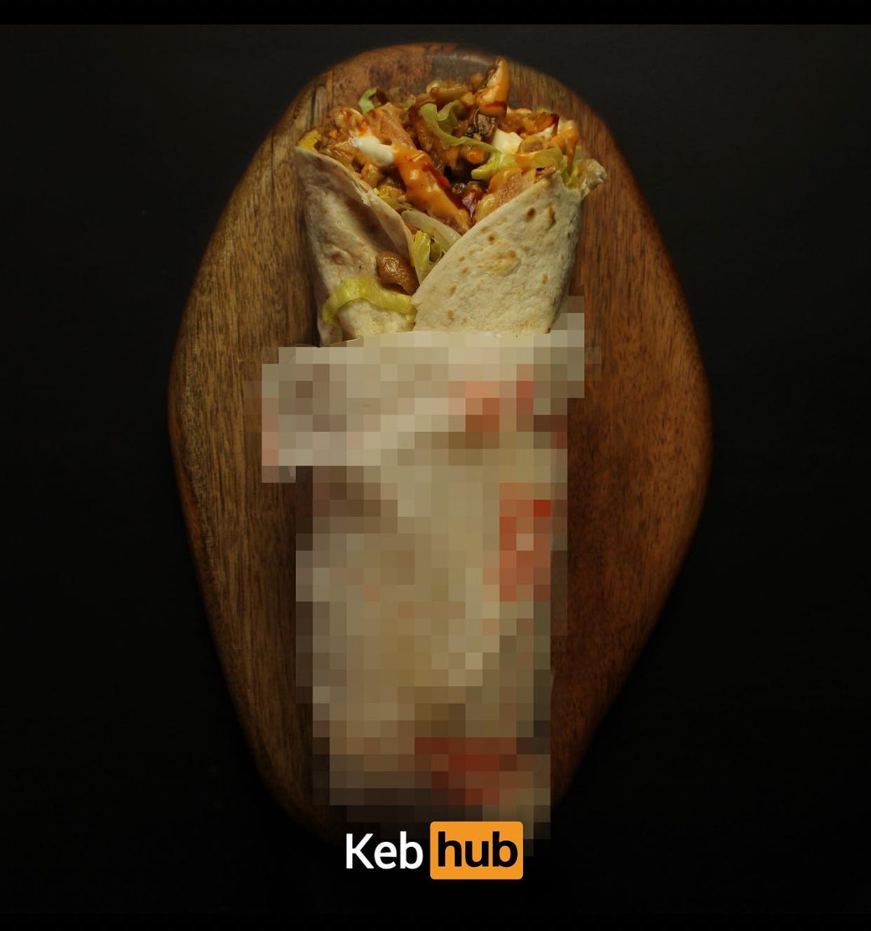 Immagine di un kebab per metà pixelata