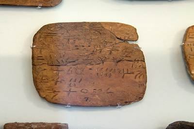 Linear A inscription on a clay tablet from Hagia Triada, Crete, probably dating to the 15th century BC. Source: Archaeological Museum of Heraklion / Zde via Wikimedia Commons (CC BY-SA 4.0). Linear A inscription on a clay tablet from Hagia Triada, Crete, probably dating to the 15th century BC. Source: Archaeological Museum of Heraklion / Zde via Wikimedia Commons (CC BY-SA 4.0).