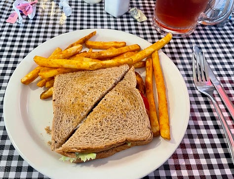 Photos of Tommy's massive plate of chicken fried steak with mashed potato's and gravy and my tasty BLT, and a shot of RV in the campground.