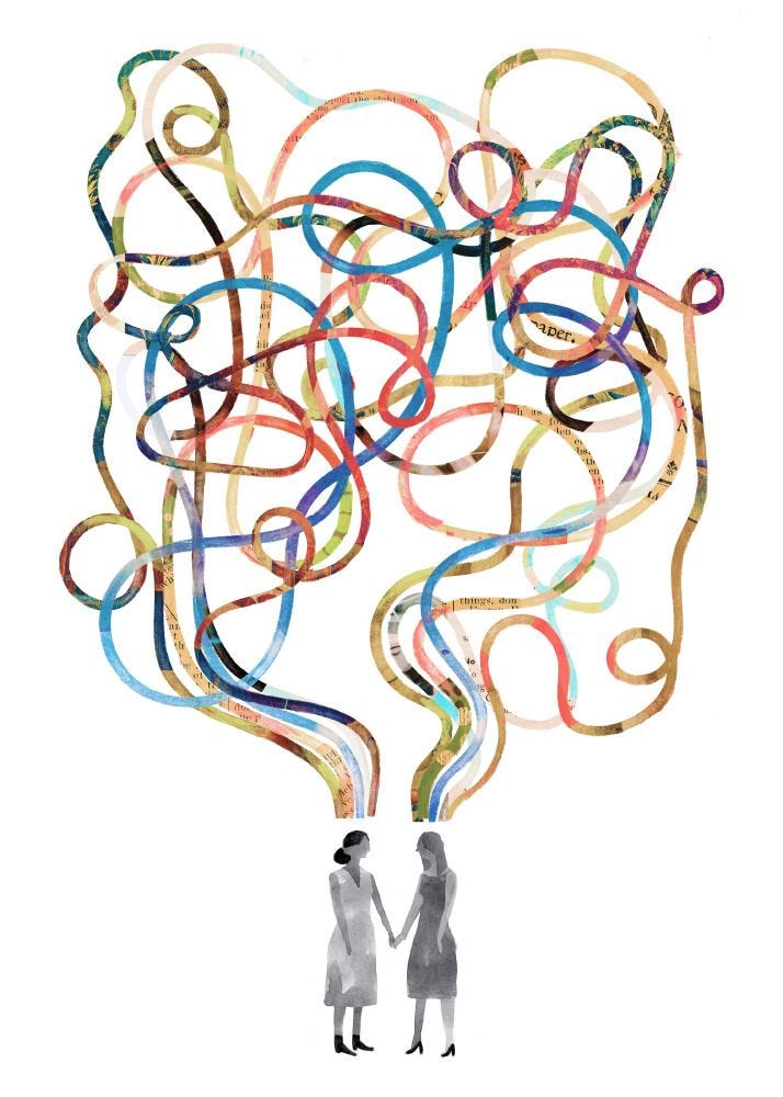 This may contain: two people standing in front of a drawing of a thought bubble with colored lines coming out of it This may contain: two people standing in front of a drawing of a thought bubble with colored lines coming out of it