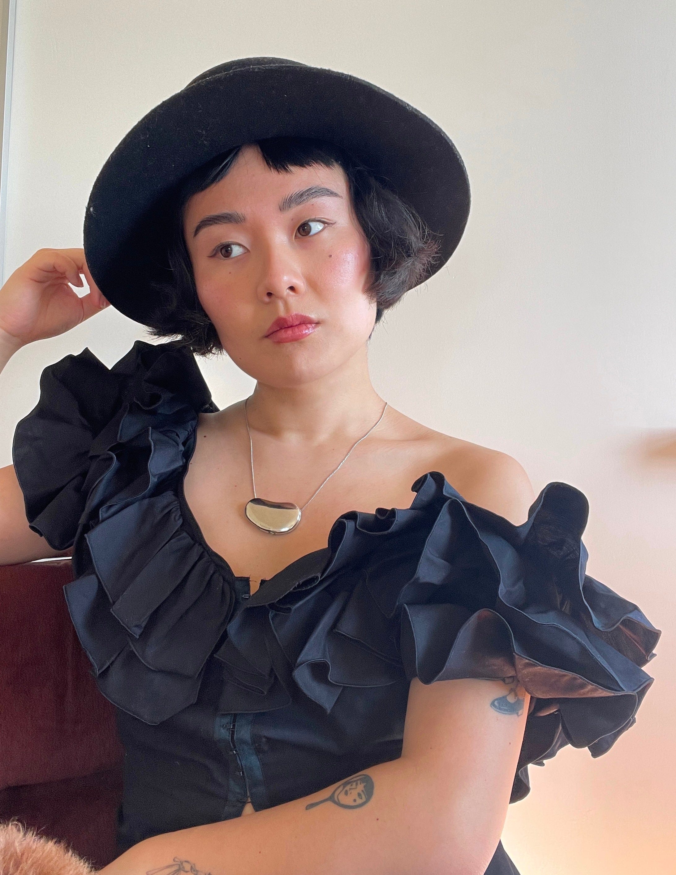 all my coolest vintage tops are from this obscure designer