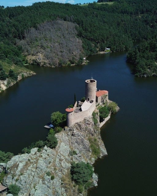 May be an image of Eltz Castle and lake