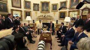 May be an image of 11 people, the Oval Office and text