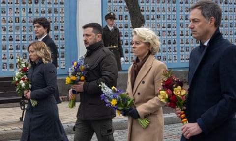 Italian prime minister Giorgia Meloni, Canadian prime minister Justin Trudeau, Ukrainian president Volodymyr Zelenskiy, European Commission president Ursula von der Leyen and Belgian prime minister Alexander De Croo attend a wreath-lying ceremony in Kyiv.