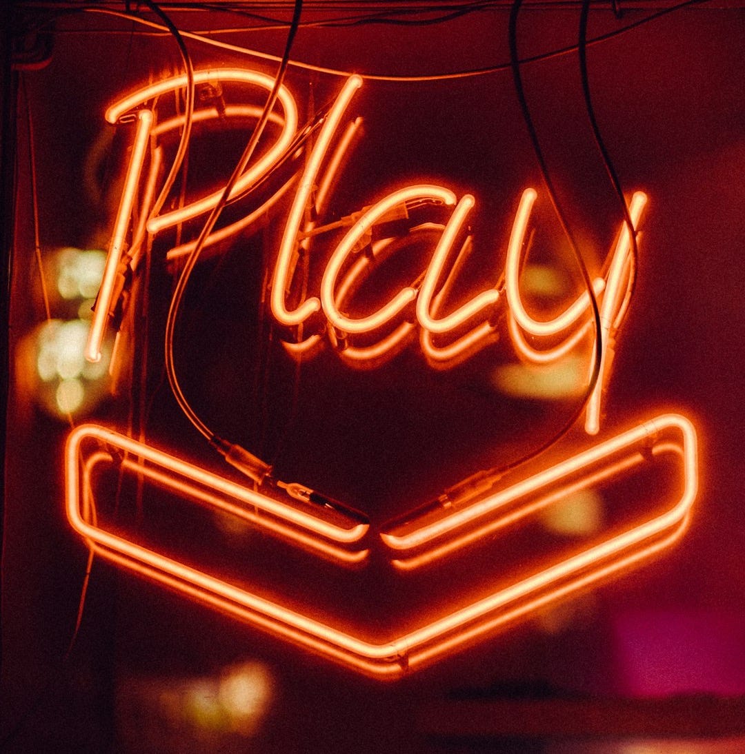 red Play neon light signage