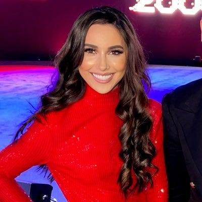 A person in a red dress

AI-generated content may be incorrect.