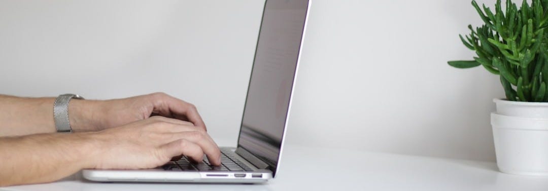 person using laptop