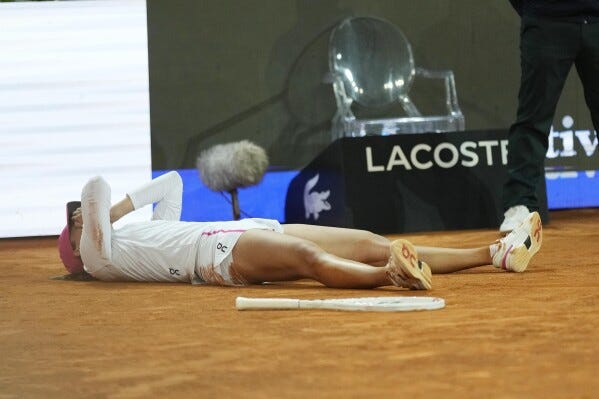 Swiatek saves 3 match points to beat Sabalenka in Madrid Open final | AP  News