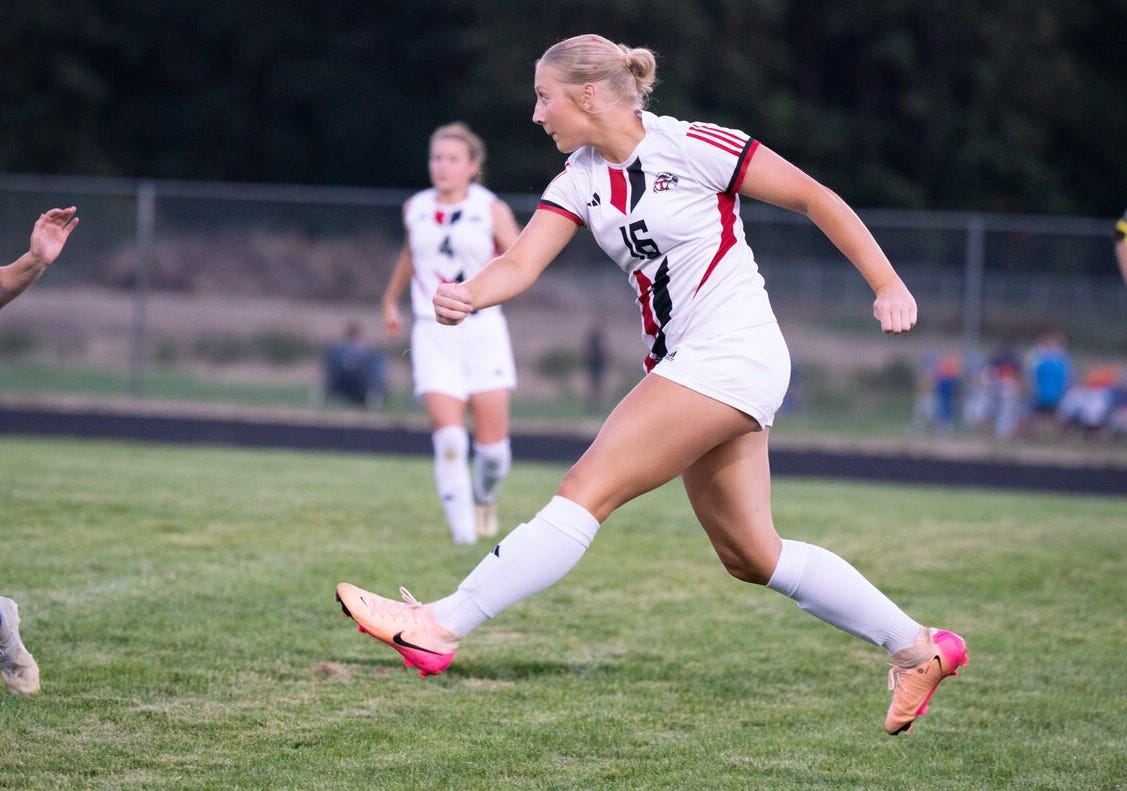 Toledo’s Kailea Lairson kicks the ball down field to a teammate during a match at Rochester High School on Thursday, Sept. 18, 2025. Toledo’s Kailea Lairson kicks the ball down field to a teammate during a match at Rochester High School on Thursday, Sept. 18, 2025.