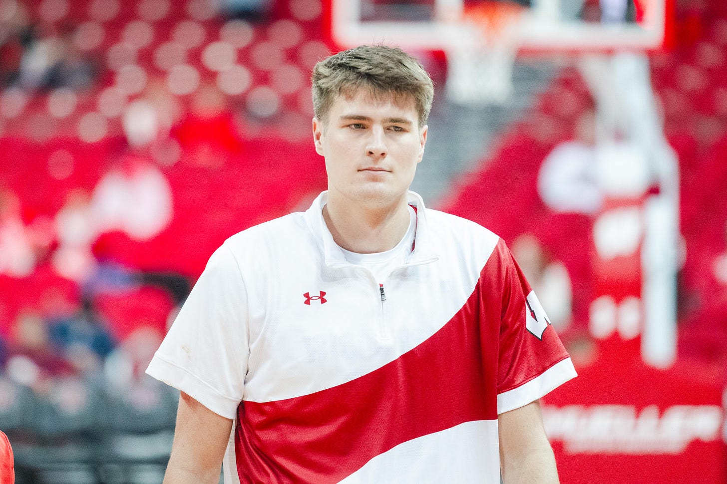 Nolan Winter in warmup clothing facing toward camera