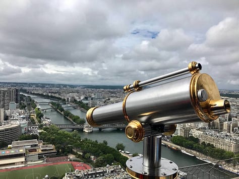 The author's pictures at the Louvre, Montremarte, Moulin rouge, and some city views