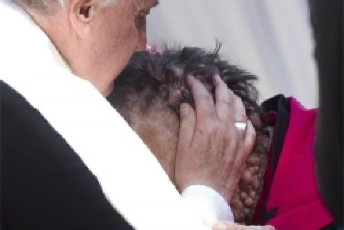 Pope Francis hugs man with tumorous disease | Catholic News Agency
