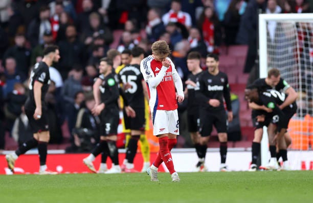 Martin Odegaard of Arsenal looks dejected after the Premier League match between Arsenal FC and West Ham United FC at Emirates Stadium on February...