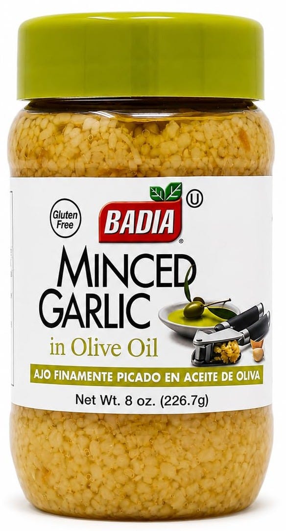 a jar of Badia Minced Garlic, 8 oz on a white background a jar of Badia Minced Garlic, 8 oz on a white background