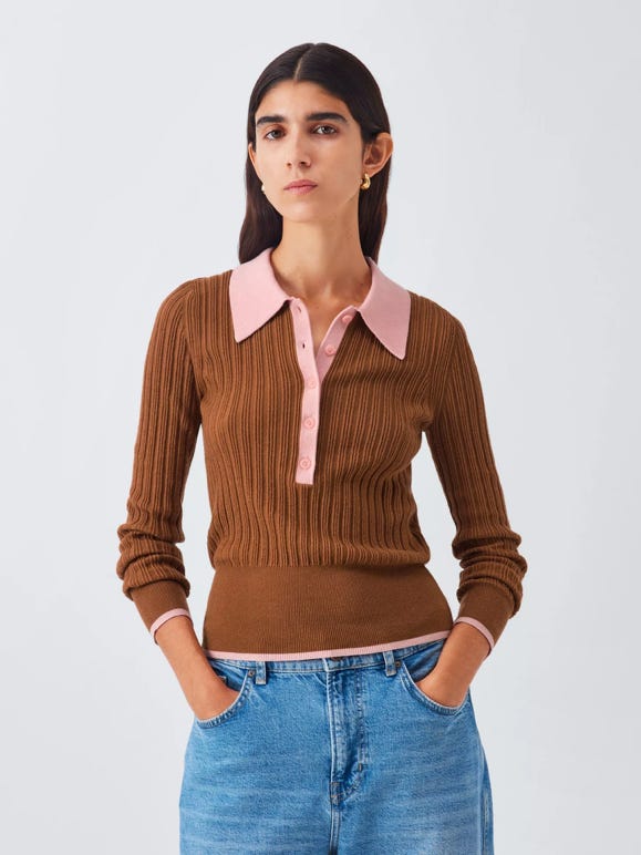 A person with her hands in her pockets

AI-generated content may be incorrect.