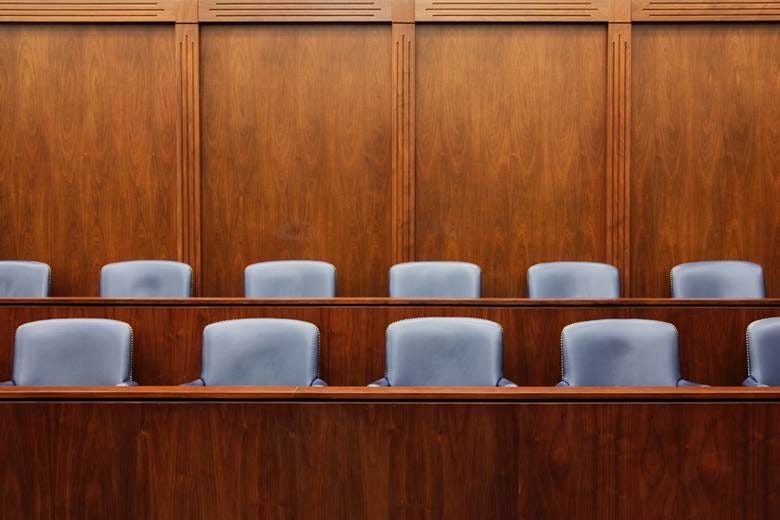 Empty chairs in jury box Empty chairs in jury box